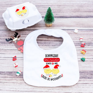 Babero "Sorpresa esta Navidad somos uno más"